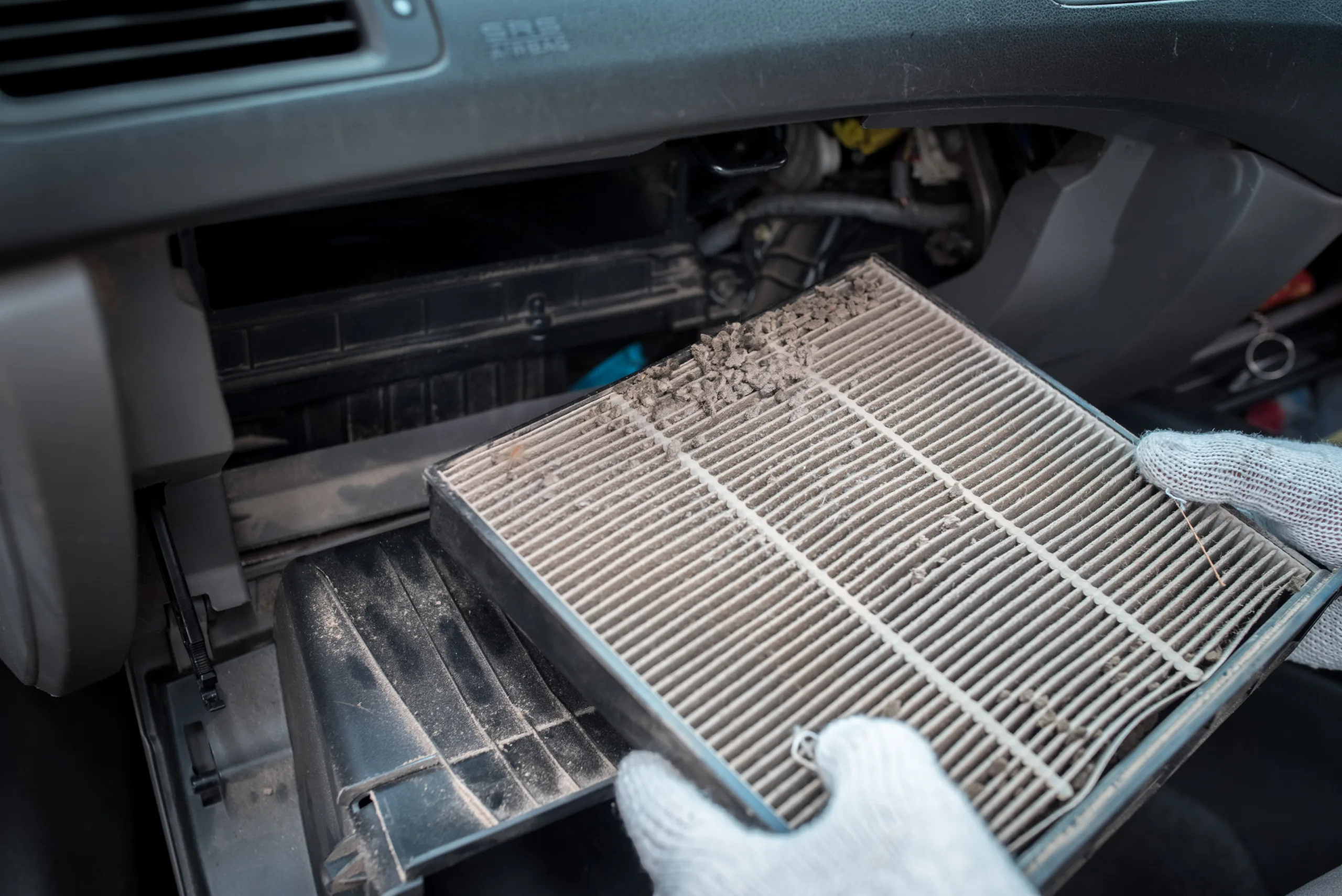 Car air conditioner filter in the cabin of the car is dirty and